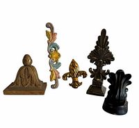 Group shot of five vintage wall décor ornaments