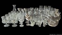 Entire assortment of clear glass barware pieces displayed together