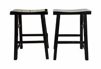 Pair of black wooden barstools side view