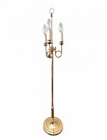 Full view of solid brass floor lamp with three candle lights and round base