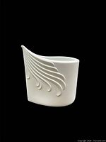 Side view showing relief pattern and form