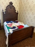 Full view of assembled antique wooden bed frame