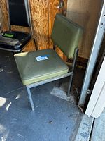 Full view of chair showing frame, seat, back