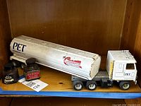ERTL tanker truck with two ink bottles on shelf