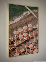 Full view of framed Italian beach poster on wall