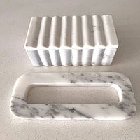 top view of marble fluted box with lid and separate cut-out slab
