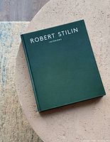 Front cover of dark green Robert Stilin Interiors hardcover book