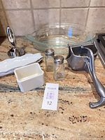 All items in lot grouped on countertop