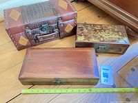 All three decorative boxes grouped on floor