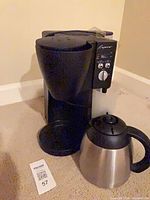 Front view of Capresso coffee maker with separate thermal carafe