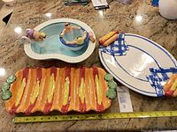 Group shot of three ceramic serveware pieces on countertop