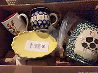 Boxed lot showing all ceramic pieces and bagged metal beaters