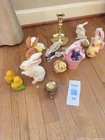 Group shot of all figurines and brass pieces