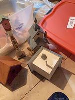 Group shot of four birdhouses and tote of fall décor