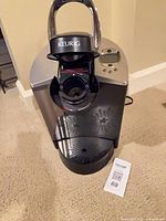 Full view of Keurig B60 coffee maker showing exterior and attached cord