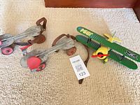 Entire lot showing both skates and biplane