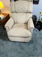 Front view of beige La-Z-Boy power lift recliner