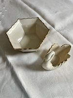 Swan dish and hexagonal bowl together showing size and color