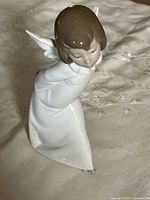 Front view of Lladró porcelain angel figurine