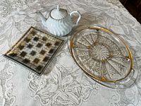 All three items: teapot, square platter, oval tray