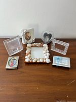 Group shot of all seven photo holders on tabletop