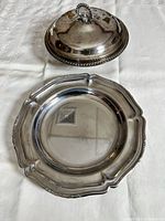 overview showing covered dish and scalloped plate