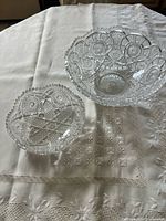 Both lead crystal bowls side by side on tablecloth