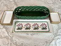 Full lot showing platter, basket and stacks of ten small plates