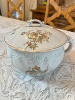 Overall view of Wedgwood covered soup bowl showing pattern, lid, handle, finial