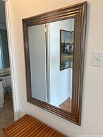 Front view of mirror showing full frame and reflection