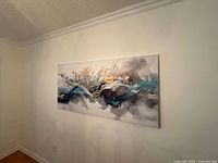 Full view of abstract canvas wall art hanging on wall