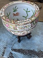 Overall view of porcelain planter on stand