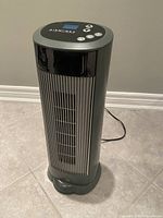 Front view of AirWorks tower heater showing grill and height