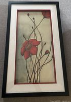 Front view of framed red flower shadow box art