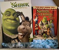 Front view of Shrek: The Story So Far box set beside Shrek the Third DVD