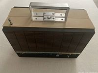 Top view showing carry handle and case design