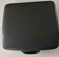 Closed black hard-shell carrying case top view