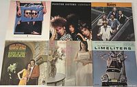 Front covers of all six LP jackets displayed in two rows