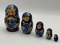 Front view of five nested dolls