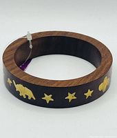 Full view of bangle showing brass elephant and star inlay
