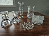 entire 10-piece clear crystal and glass set displayed on table