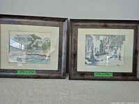 Both framed watercolors side by side