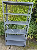 Full front view showing six shelves and cross brace