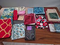 Overview of all fabric pieces spread on table