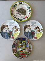 All four decorative plates arranged