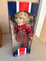 Front view of boxed porcelain Beefeater doll
