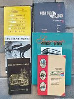 All six books laid out