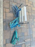All items laid out: hangers, two metal shoe racks, plastic drawer organizer