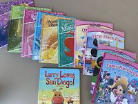 Row of Disney hardcover picture books and board book