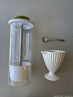 Herb keeper, ceramic bowl, spoon side-by-side